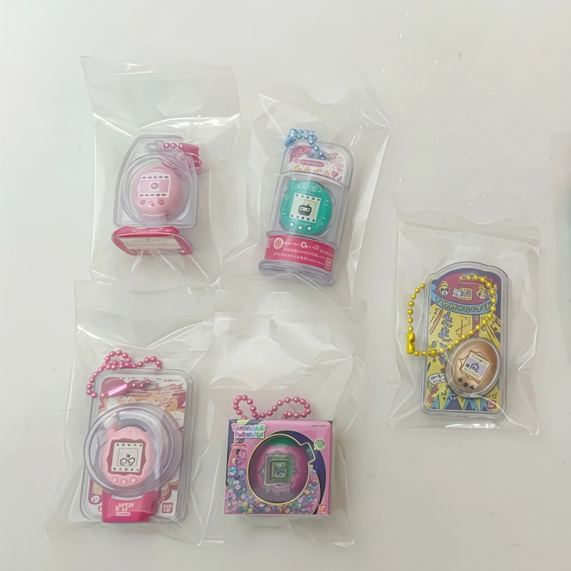 Tersedia Bandai Tamagotchi Hew - Bandai Model Tamagotchi ulasan dan harga